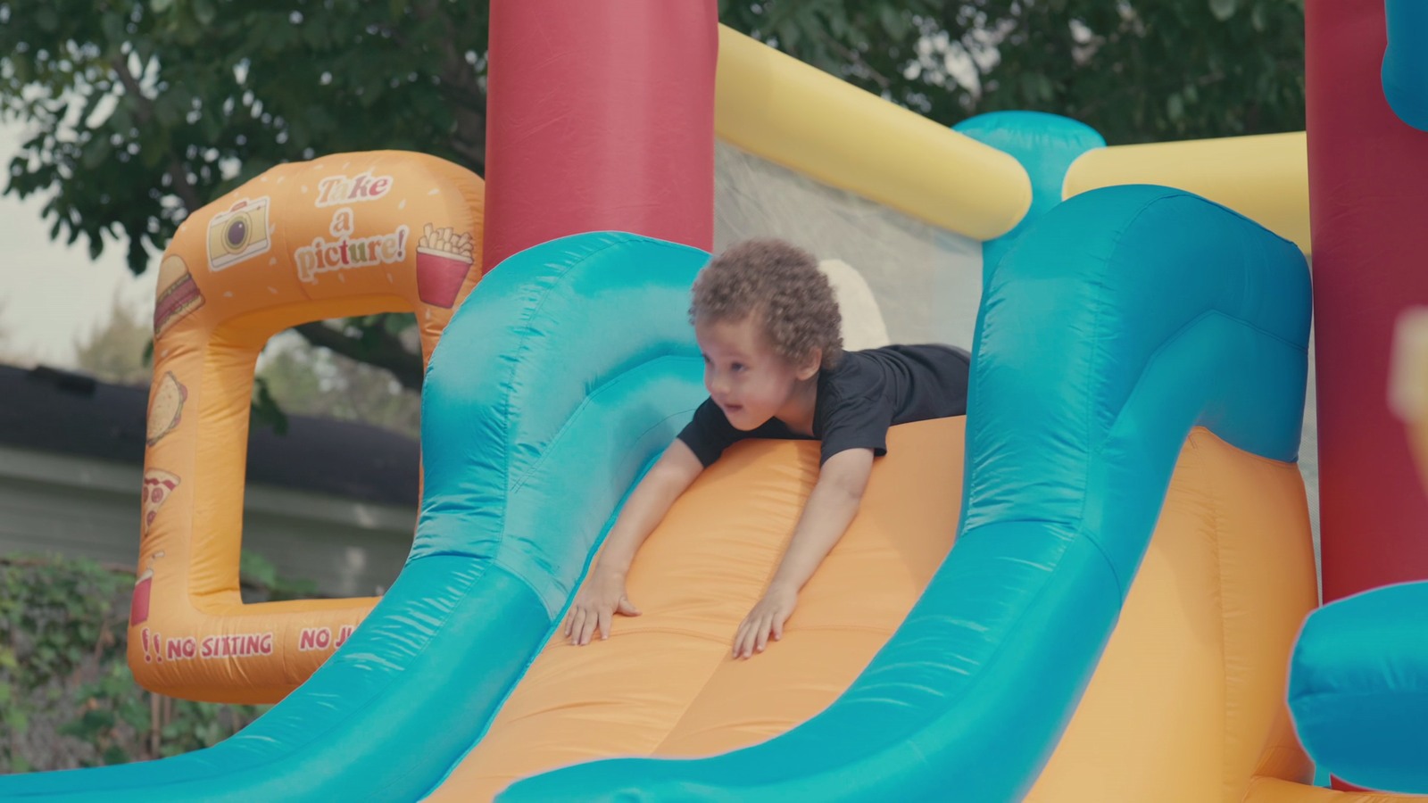 Children playing on the trampoline